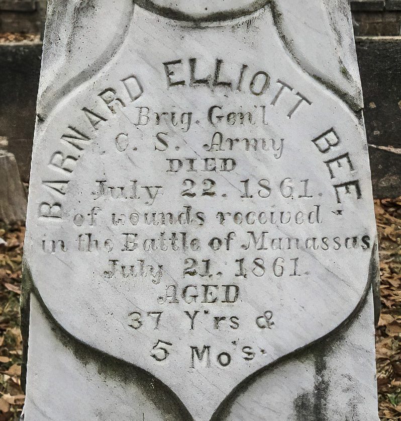 a stone wall” (SHSP, 1891);             to Robert Barnwell Rhett, Sr.,           Soon afterward Spratt quit the     left hand resting on sword hilt, pillar visible on left.